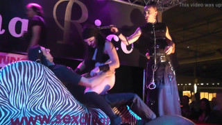 Bdsm blowjob on stage brunette
